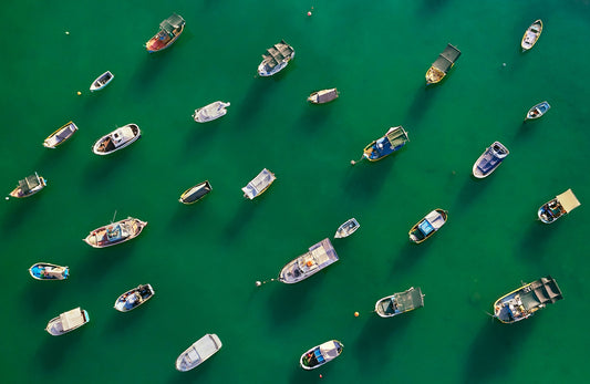 At anchor - Aerial over Marsaxlokk fishing village, Malta