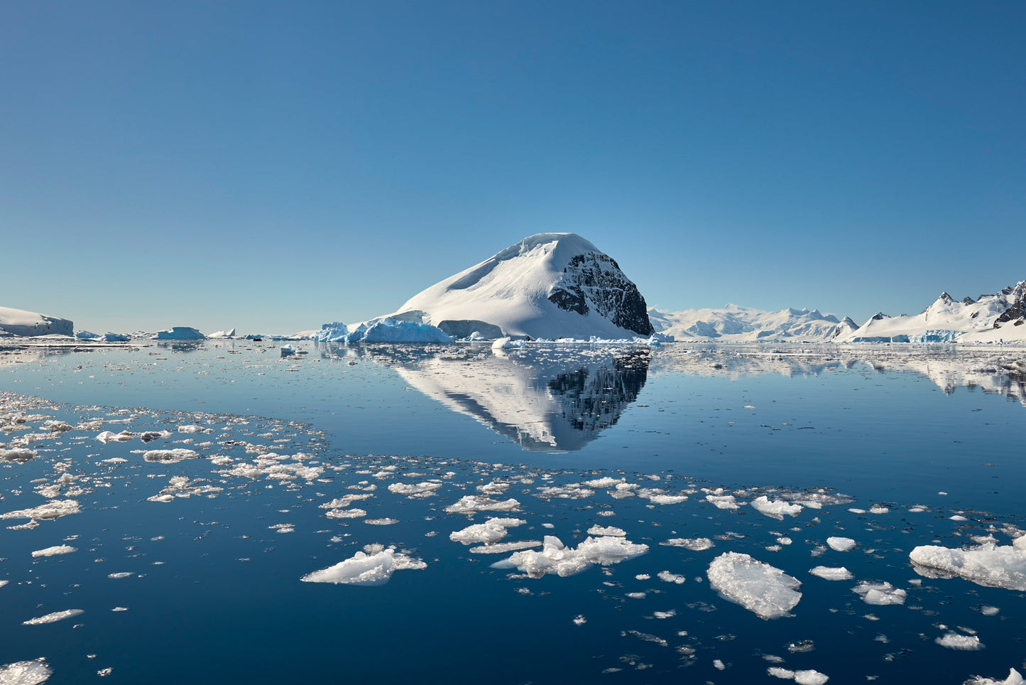 Island reflection - Cuverville Island, Antarctica